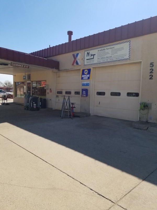 Shop front and service bays with NAPA AutoCare signage